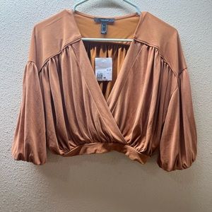 cropped tan v neck top